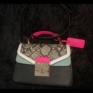 Teal, Pink, snake scale Aldo crossbody handbag.
